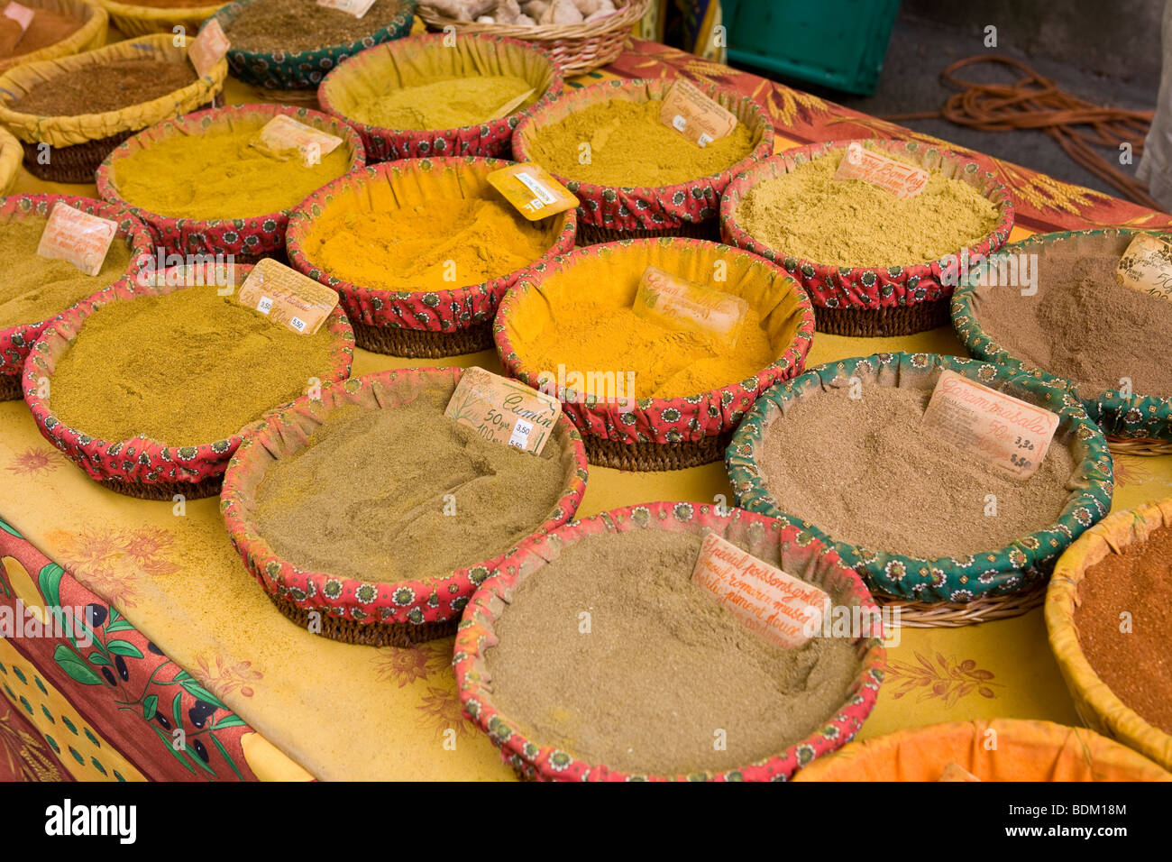Loose curry powders for sale in an open street market in St Remy, Avignon, France Stock Photo