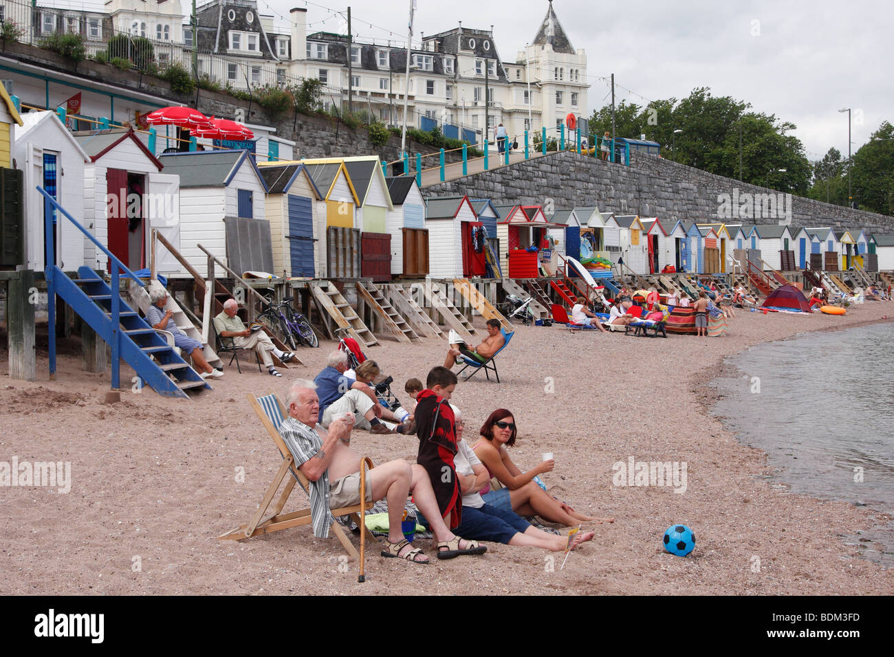 British family on seaside holiday, Torquay beach, Devon, England, UK Stock Photo