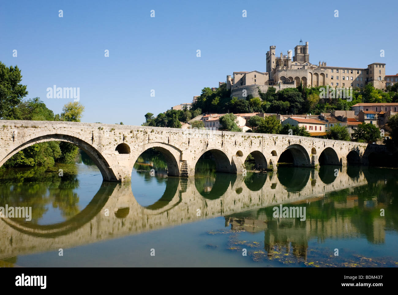 The old bridge over the River Orb in the French town of Beziers Stock Photo