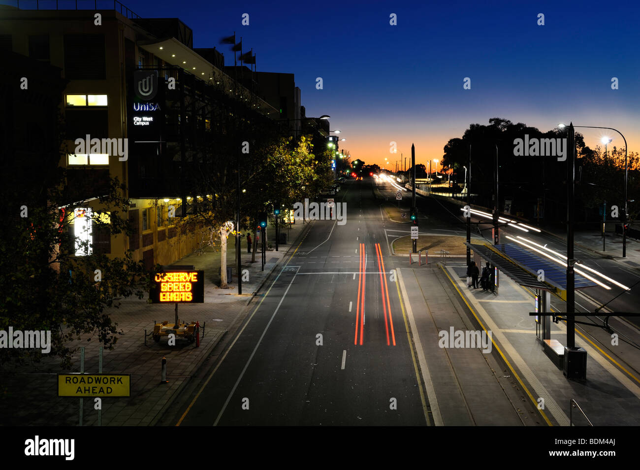 An evening view with traffic trails of North Terrace, Adelaide, Australia Stock Photo