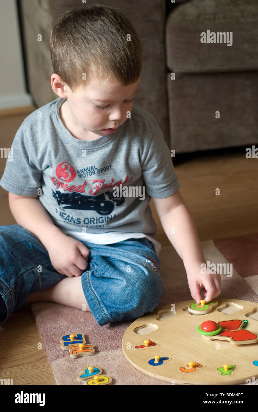 Telling the time,adventure, child, children, bedroom, playing, toy, kid, young, fun, home, house, interaction, fun, happy, Stock Photo
