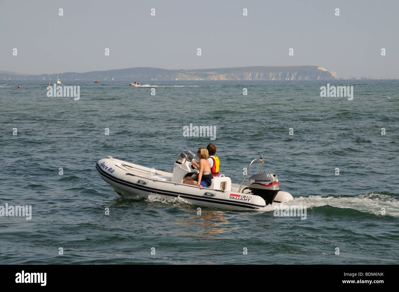 Boating of Mudeford Dorset southern England UK With a backdrop of the