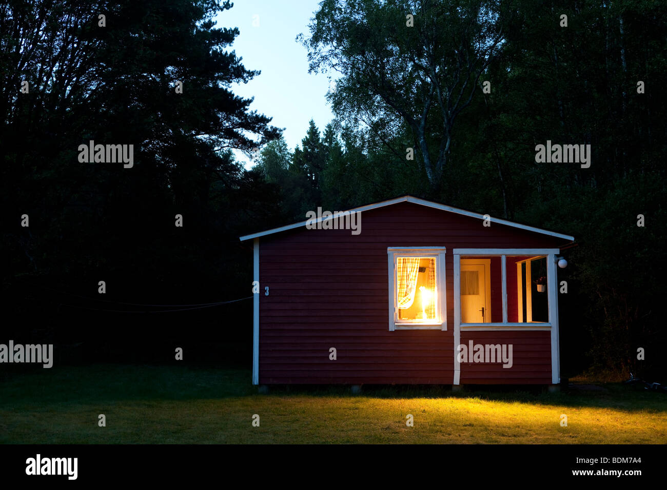 Camping cottage by night. Stock Photo
