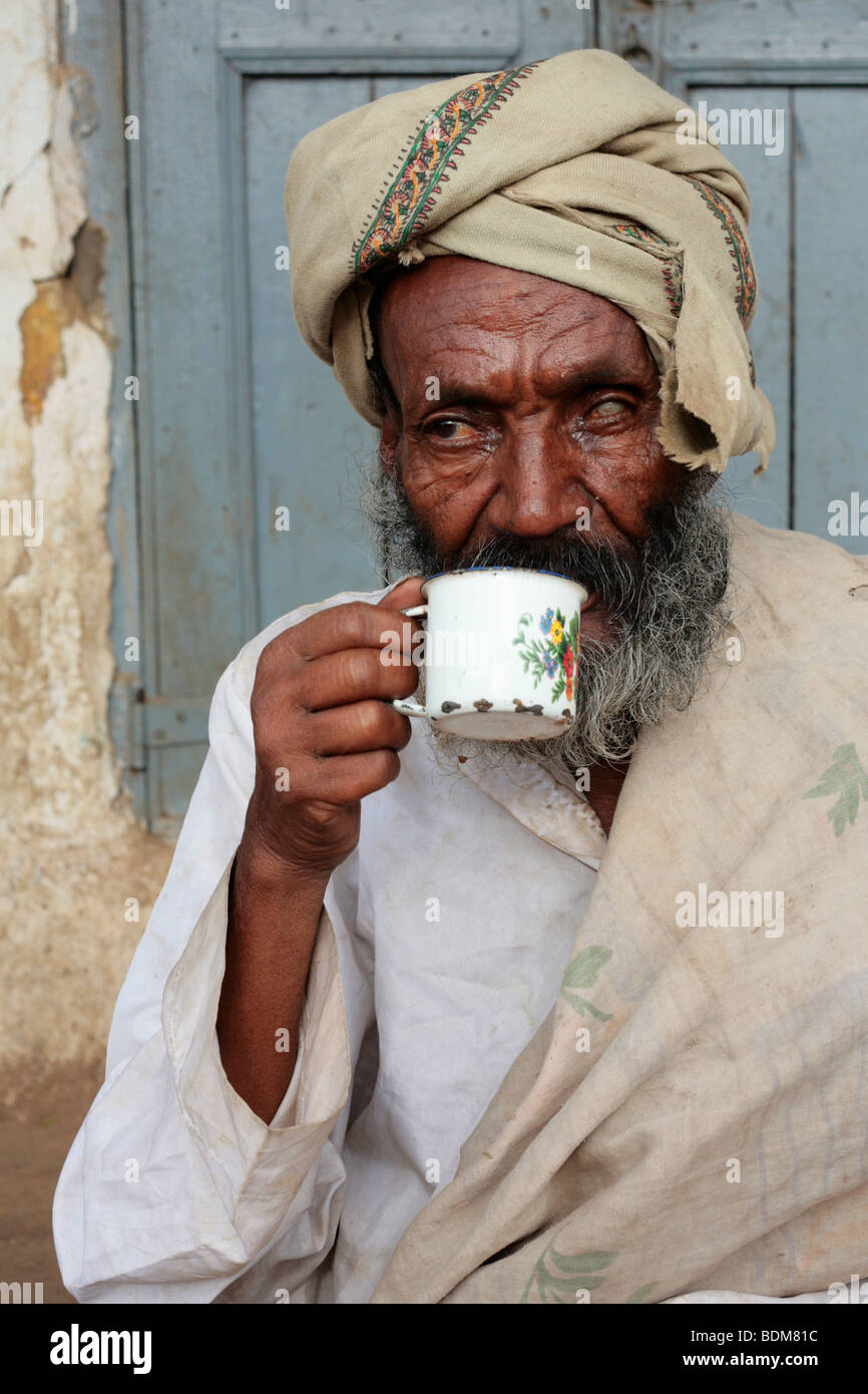 One eyed man drinking coffee in Harar Ethiopia Stock Photo