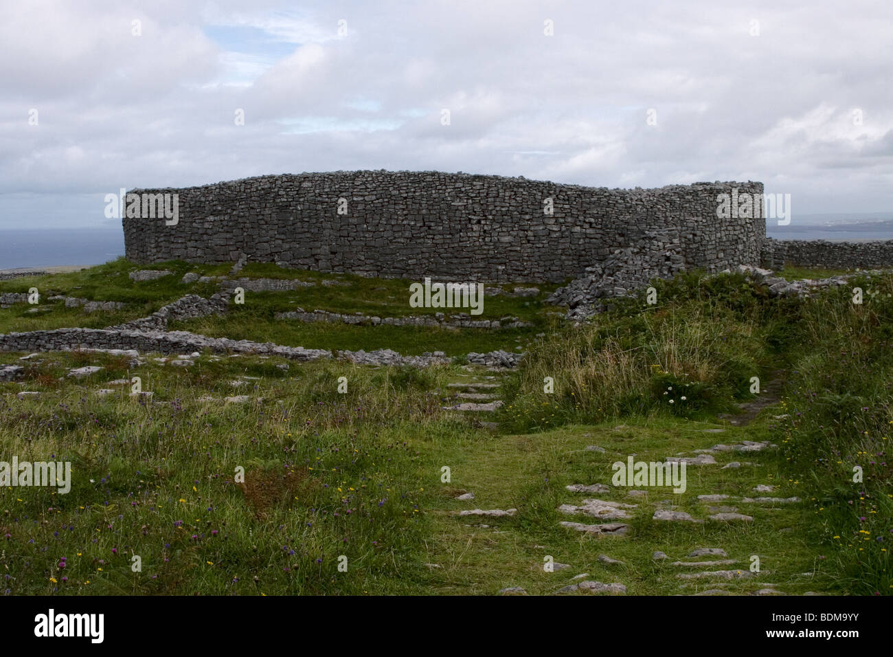 Old Fort constructed of stones, near lighthouse, Inis Mor (Inismore) Island, Aran Islands, County Galway, Ireland Stock Photo