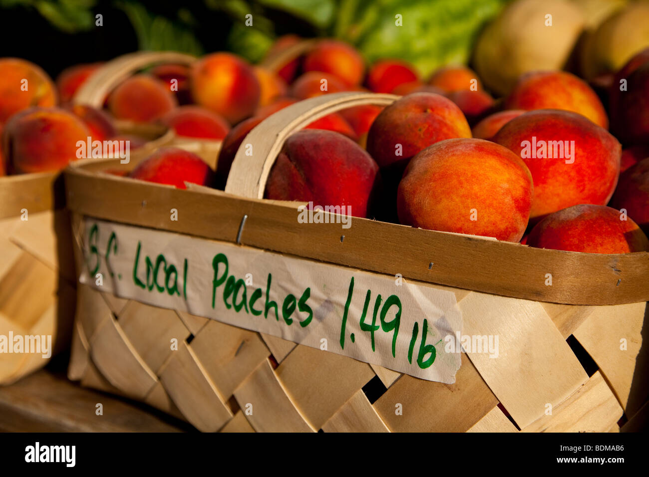 Fresh South Carolina peaches at an organic local produce farmers market