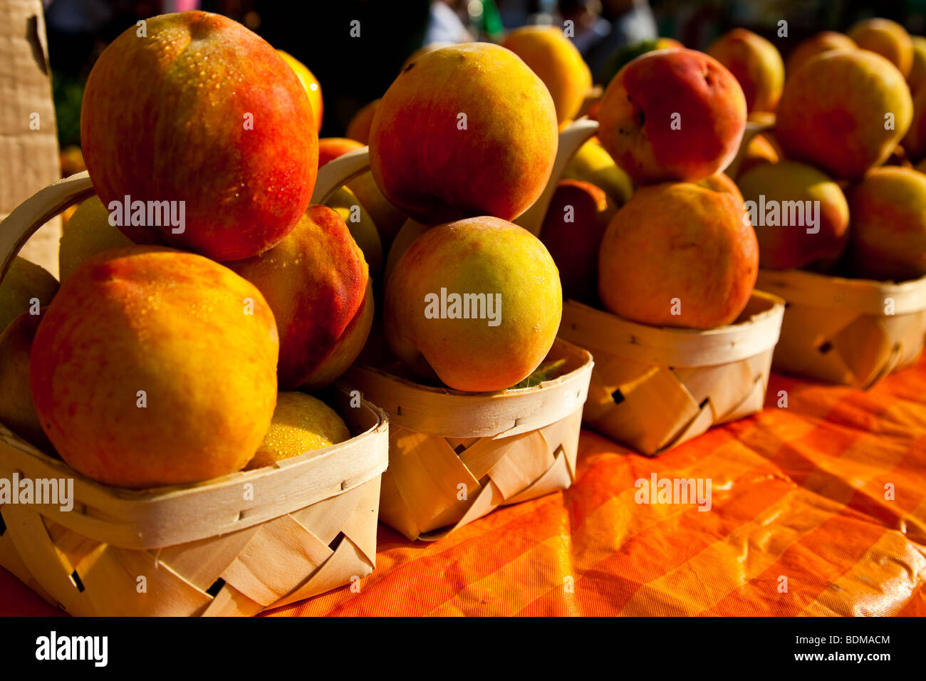Fresh South Carolina peaches at an organic local produce farmers market