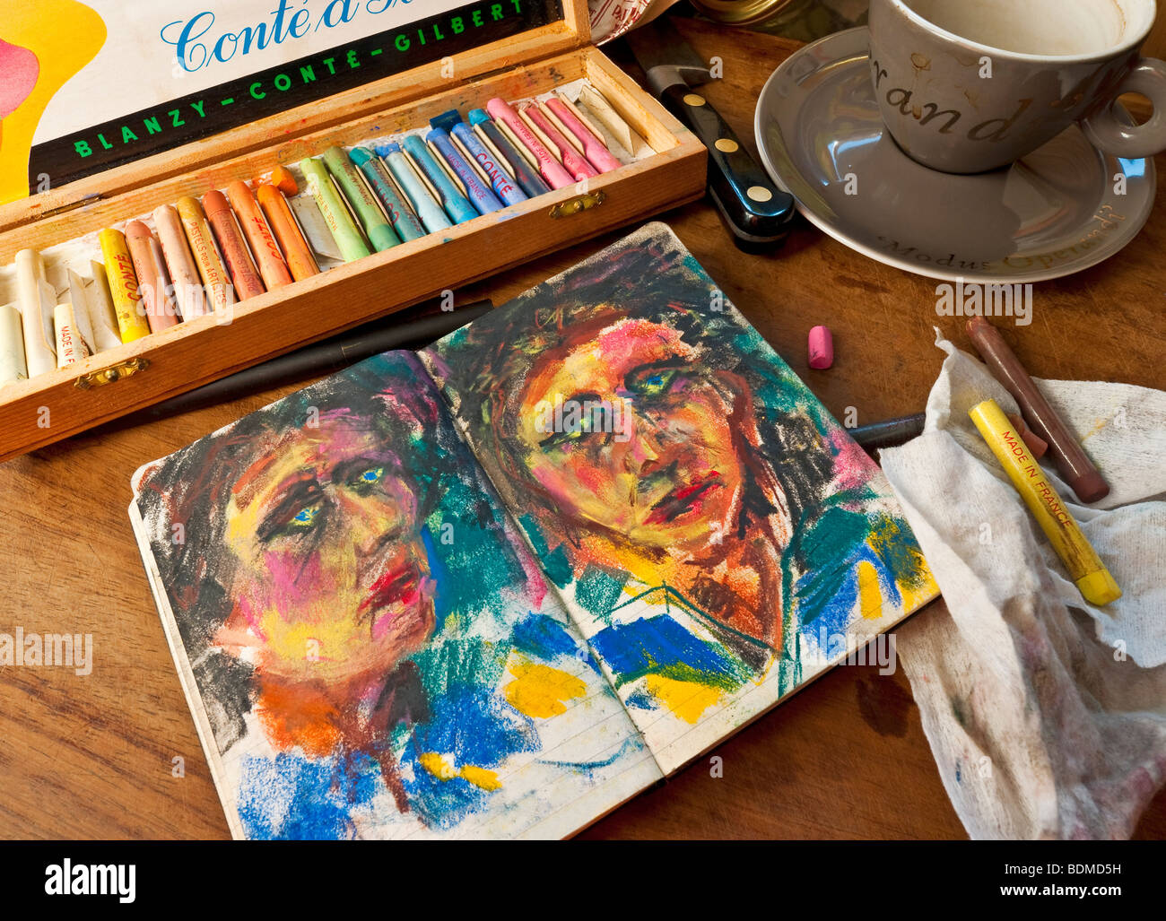 Colored Conté crayon portraits in sketchbook France Stock Photo Alamy