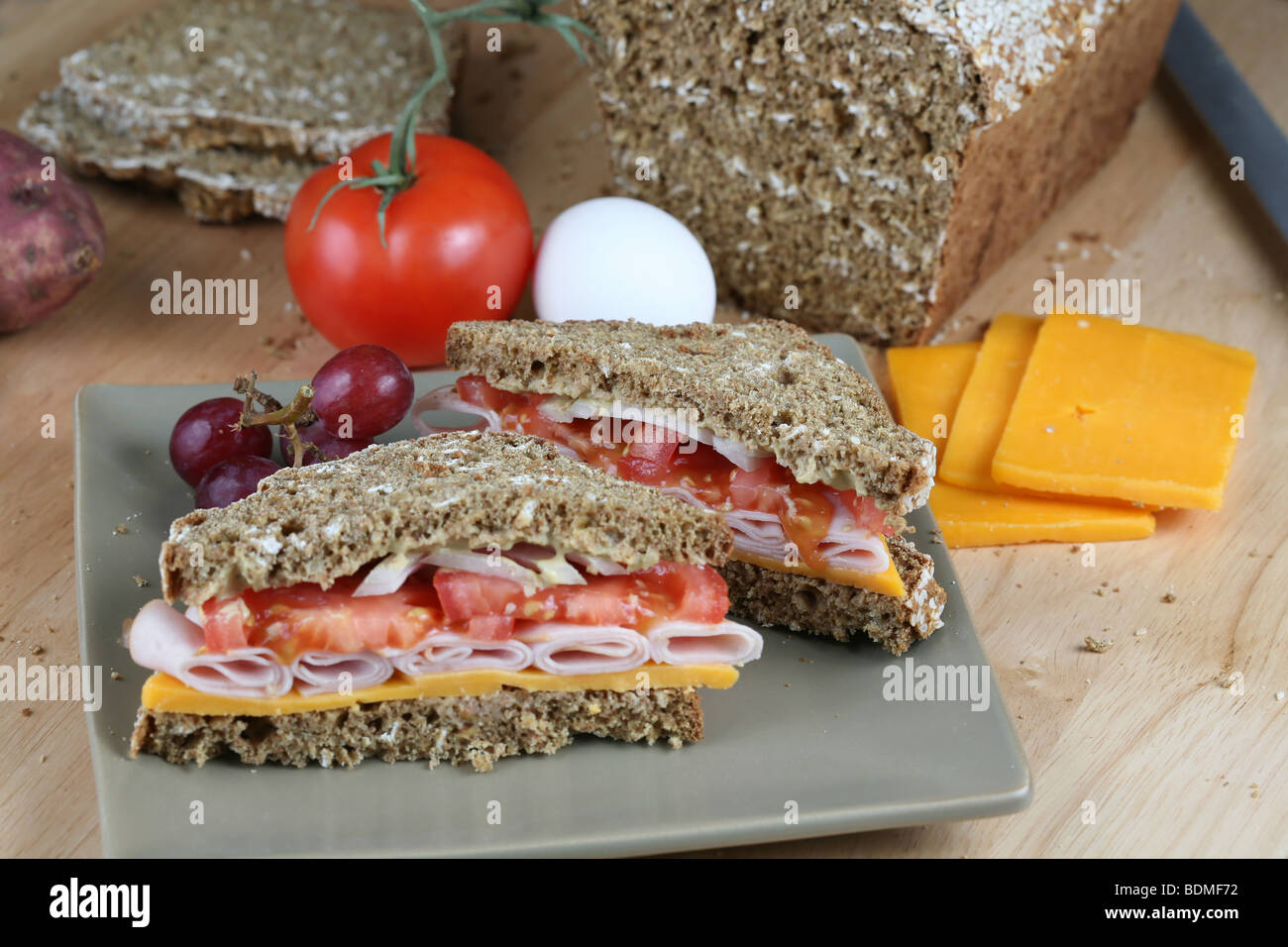 Sandwich and other food ingredients, including cheese, tomato, egg