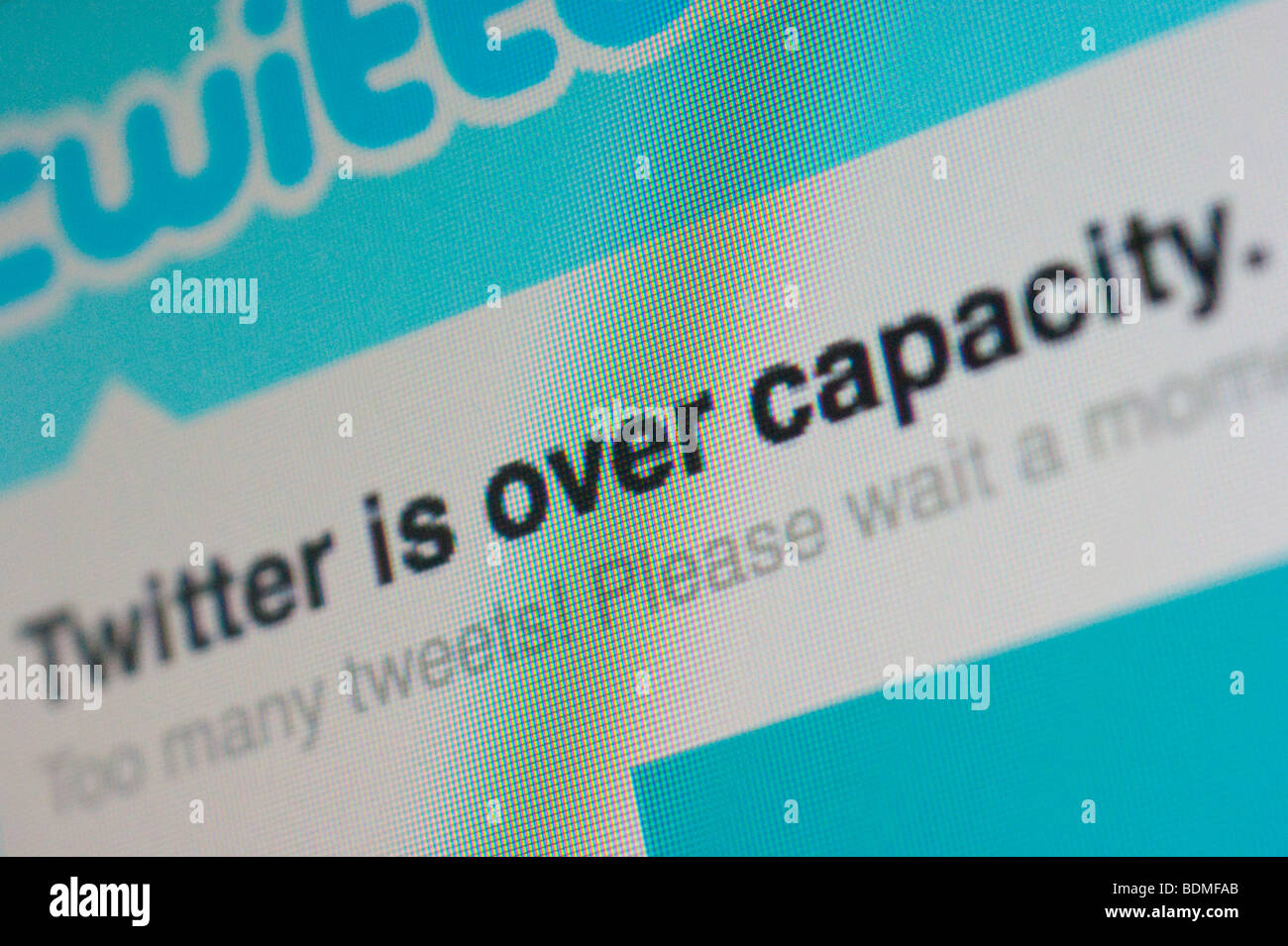 Close-up detail computer screen showing Twitter overloaded - 'Twitter is over capacity' - creative blur macro effect Stock Photo