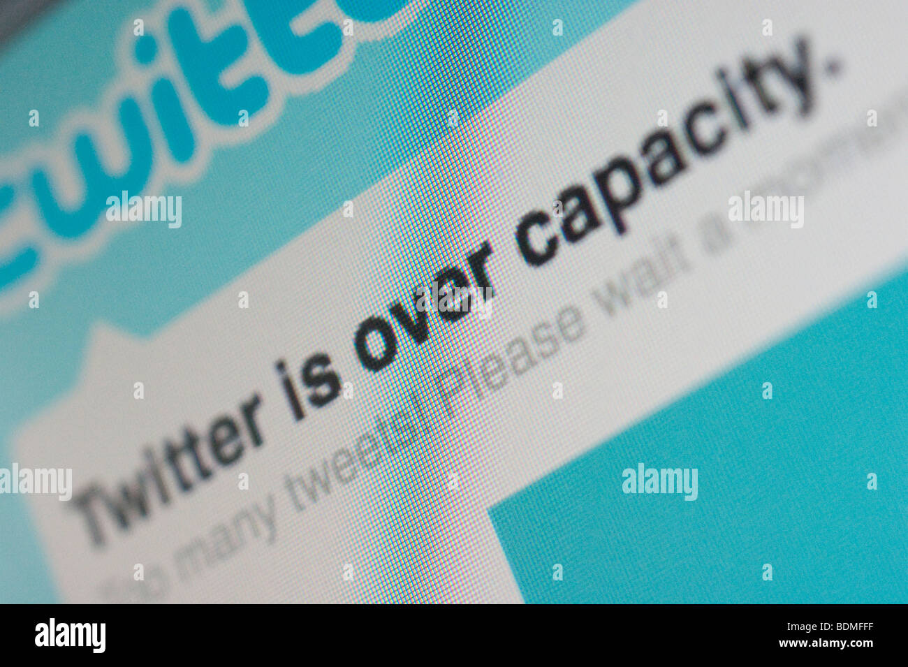 Close-up detail computer screen showing Twitter overloaded - 'Twitter is over capacity' - creative blur macro effect Stock Photo