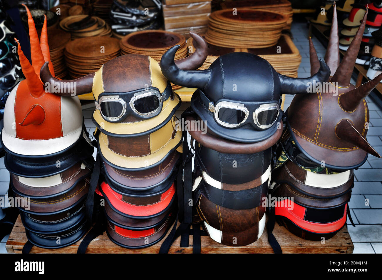 Quirky leather covered crash helmets Sanur Denpasar Bali Indonesia Southeast Asia Stock Photo Alamy