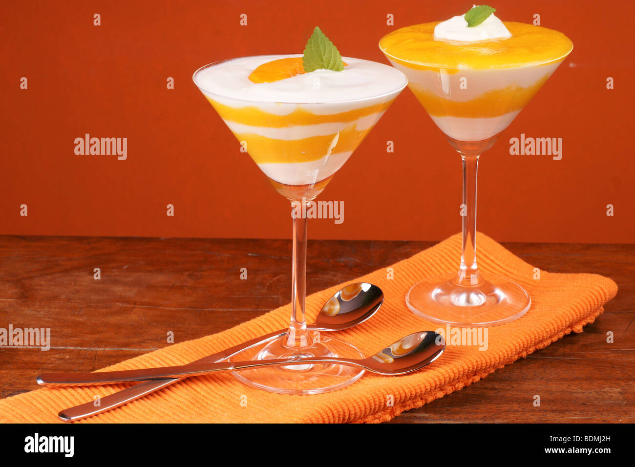 Fresh yoghurt and peach dessert Stock Photo Alamy
