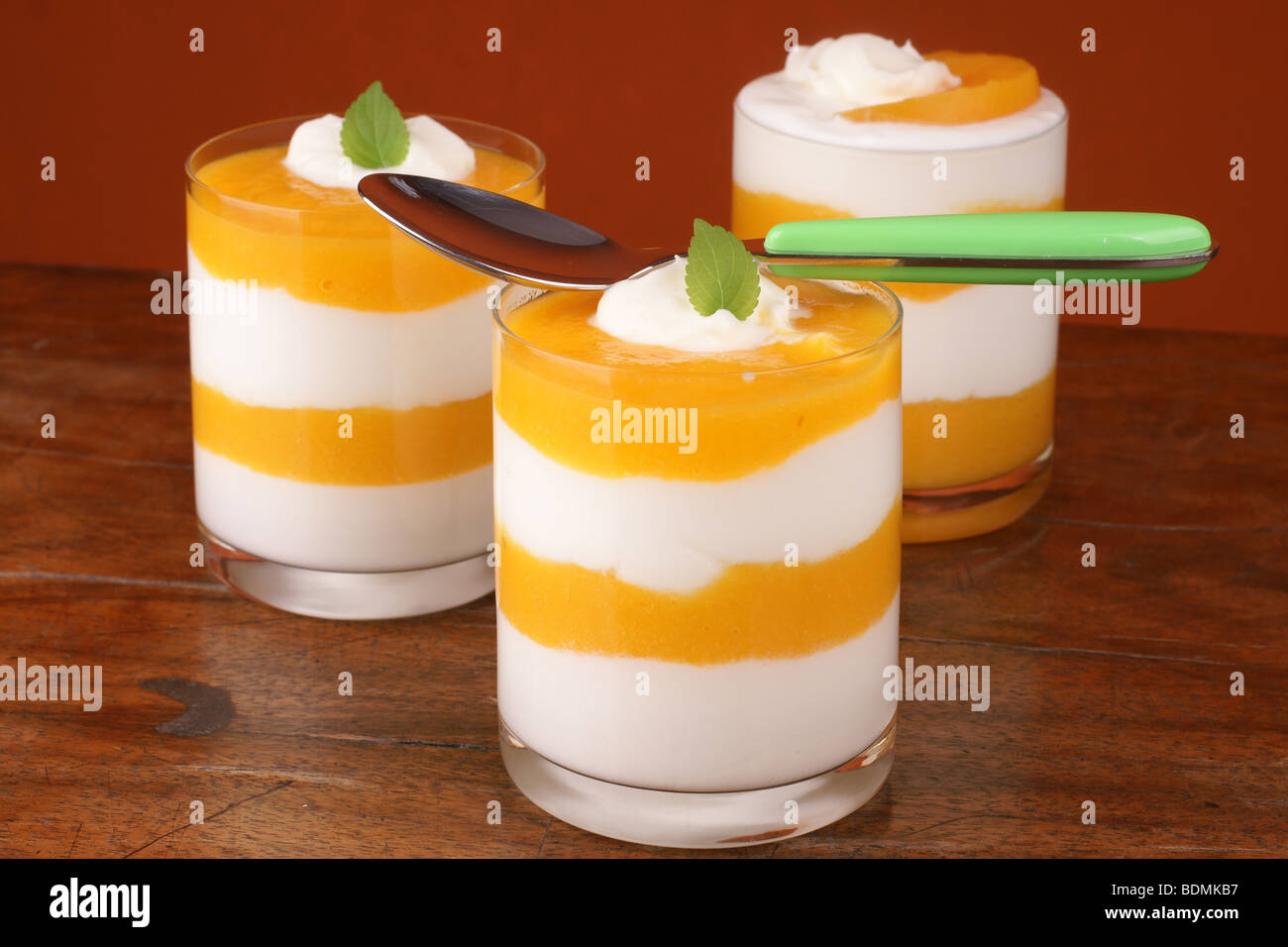 Fresh yoghurt and peach dessert Stock Photo Alamy