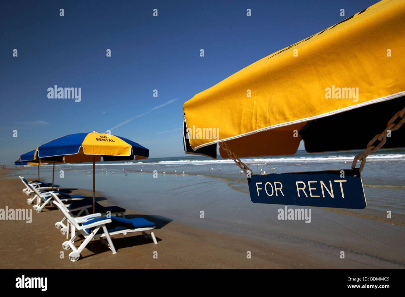 Umbrellas for rent on the beach in Daytona, Florida, USA, North America Stock Photo