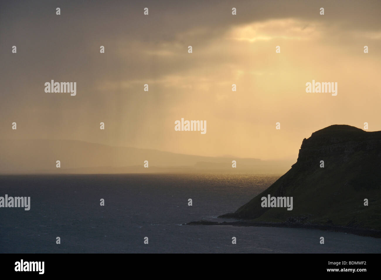 Sunset behind headland from Uig, Skye, Scotland Stock Photo