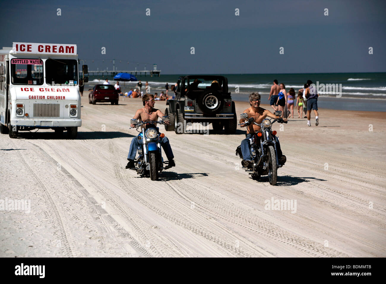 Motorcyclists and car of an ice-cream seller on the beach of Daytona, Florida, USA, North America Stock Photo