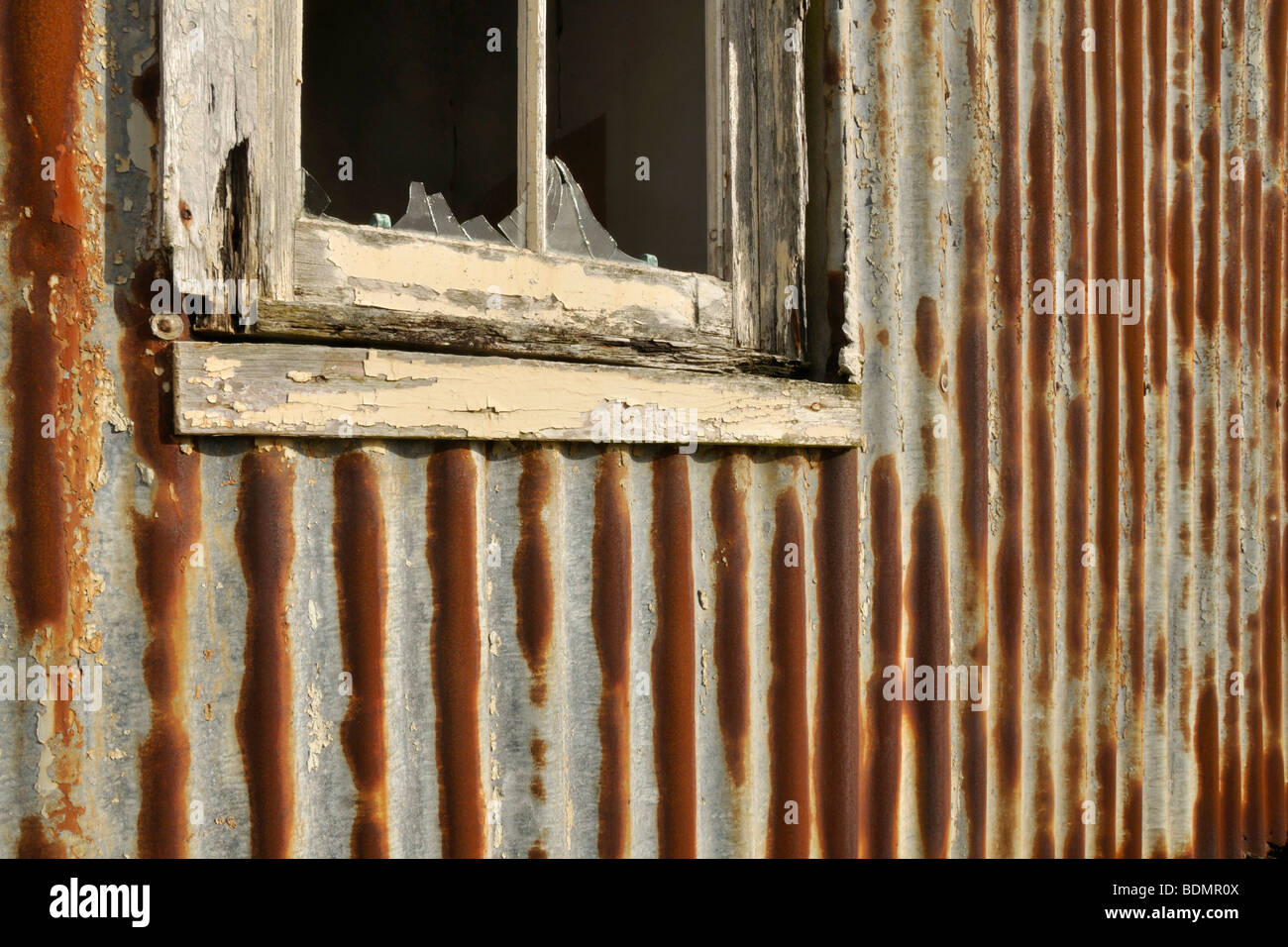 corrugated iron and broken window, abandoned croft, Scalpay Stock Photo