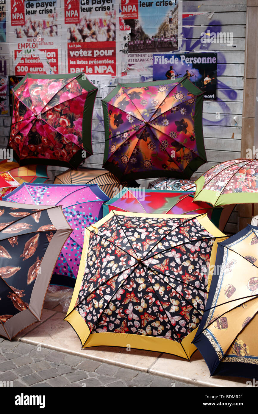 Colourful umbrellas for sale on a market stall Stock Photo Alamy