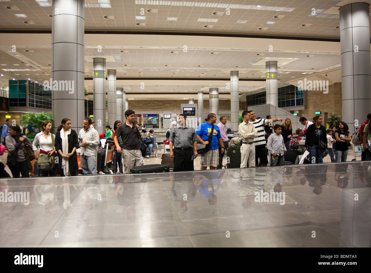 passengers waiting for luggage on Egypt Air flight, Terminal 3, Cairo