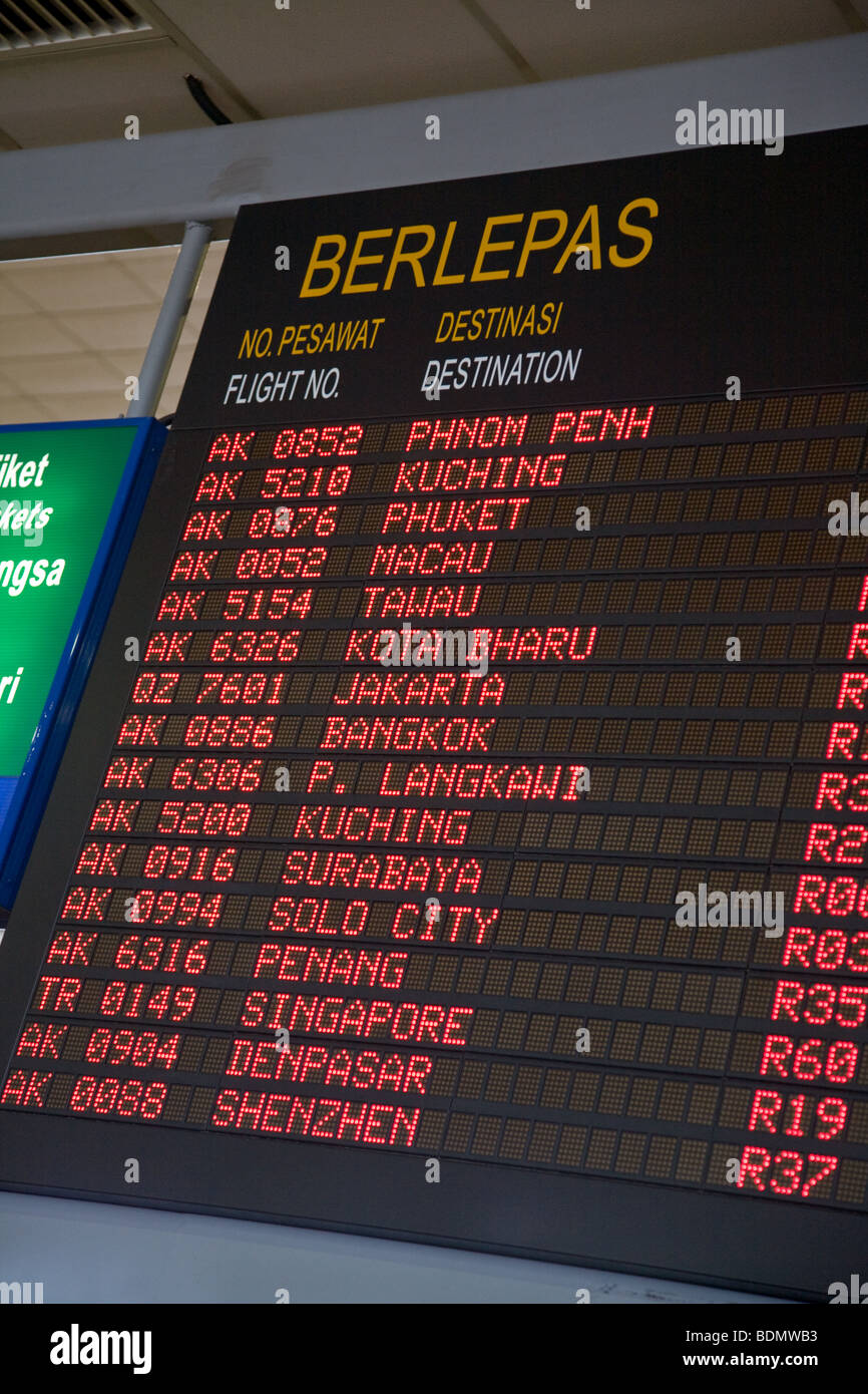 LCC  terminal departure board flight information Stock Photo