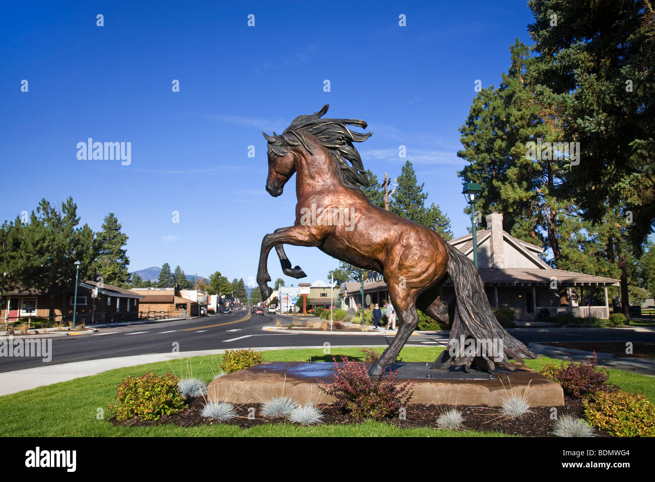A bronze horse sculpture on the main street of Sisters, Oregon, in the