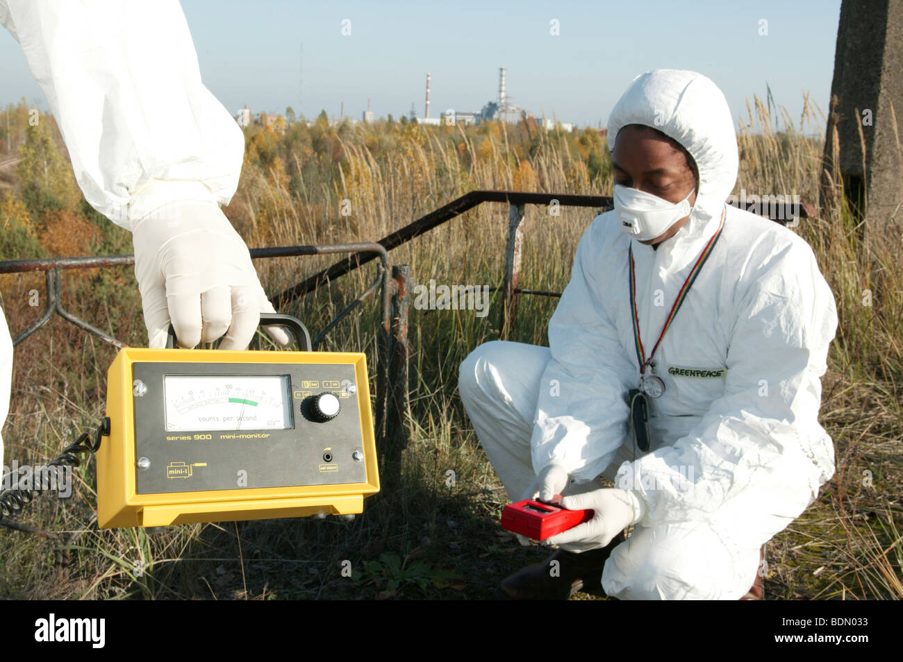 On the ground action training for Greenpeace Radiation Safety Advisors. Measuring radiation levels. Stock Photo