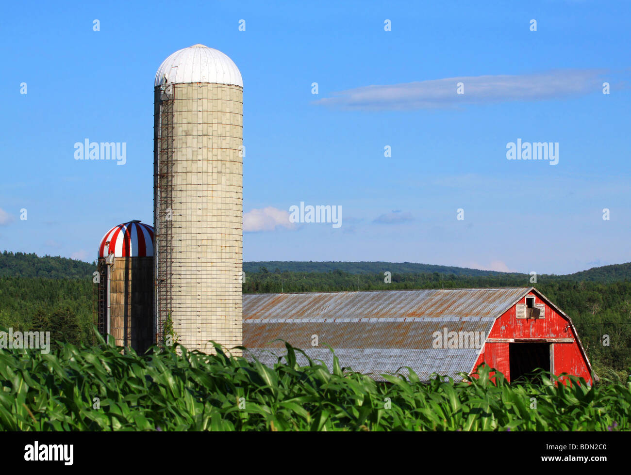 A red barn and two silos at Penobsquis, New Brunswick, Canada Stock