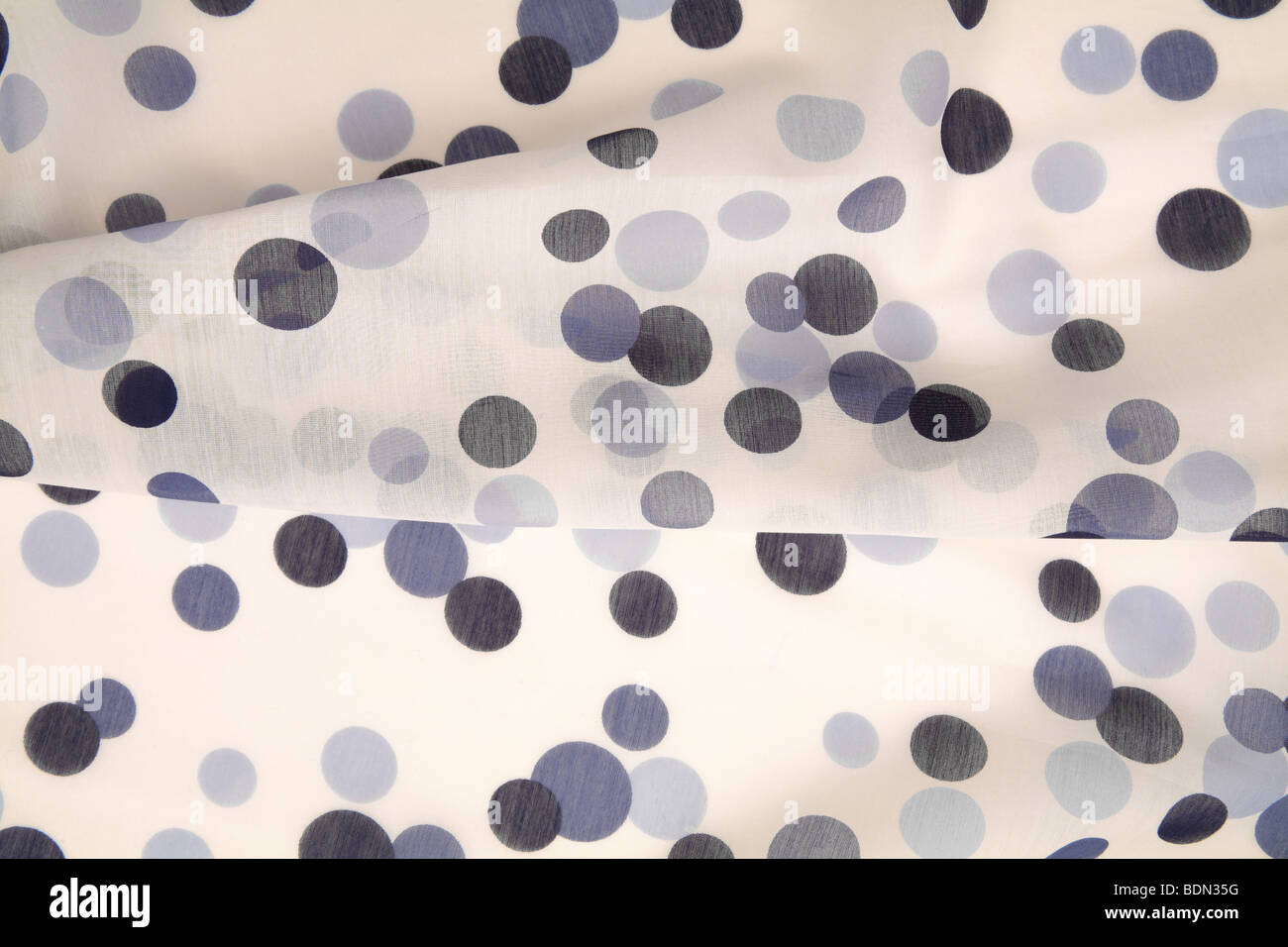 black and blue polka dot sheer silk Stock Photo