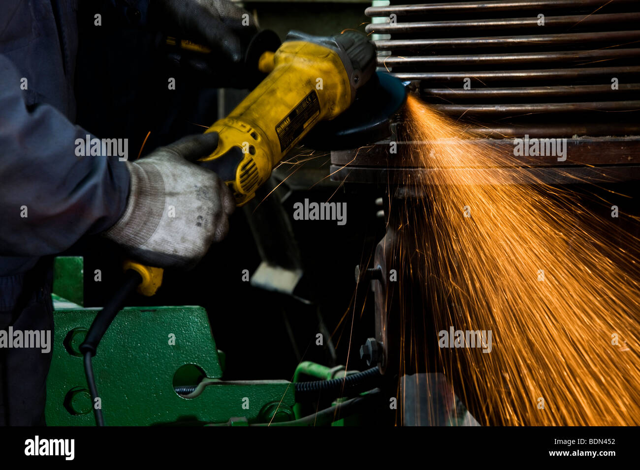 Worker friction sawing Stock Photo