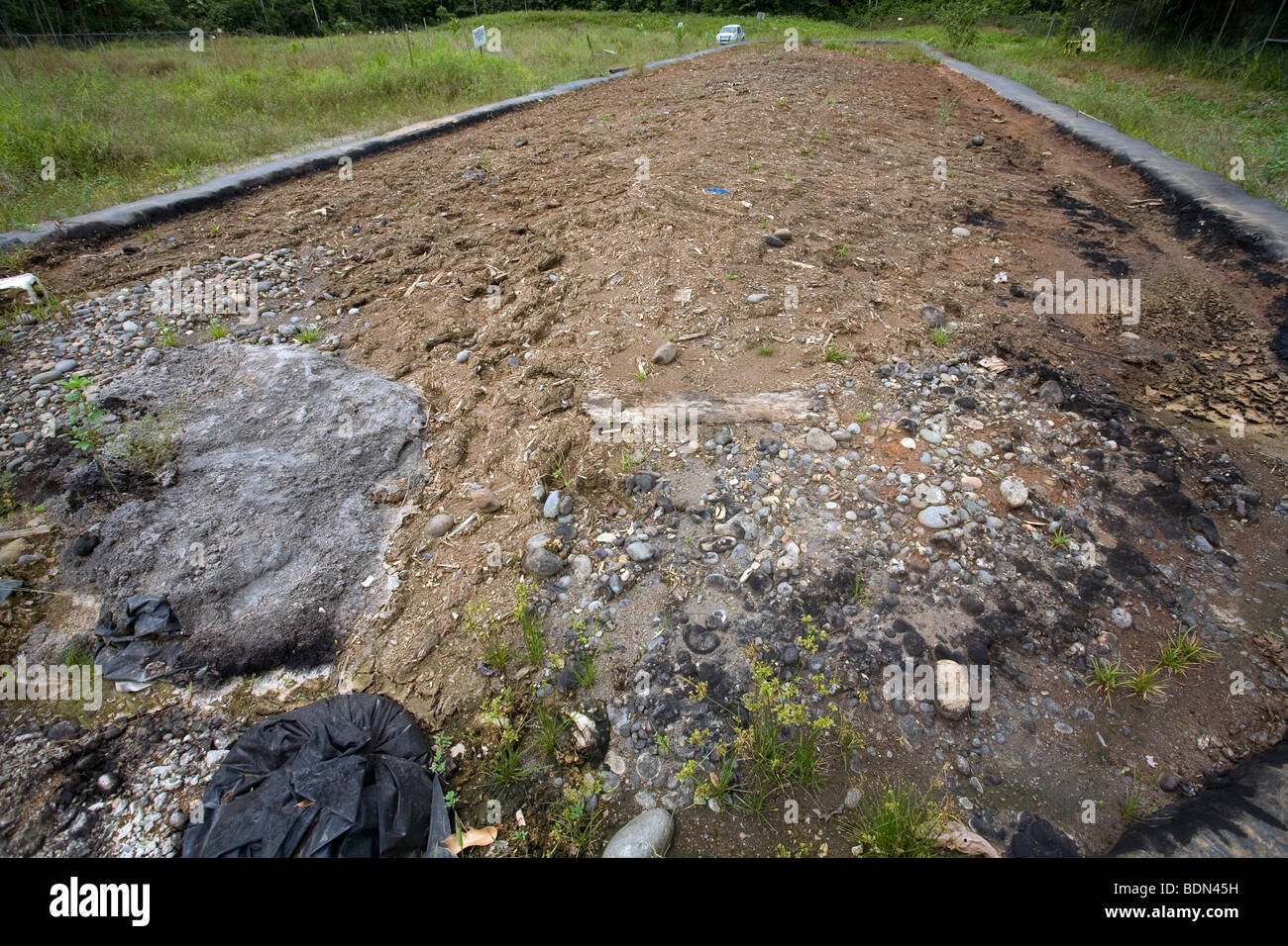 Bioremediation pit for soil contaminated with crude oil Stock Photo Alamy