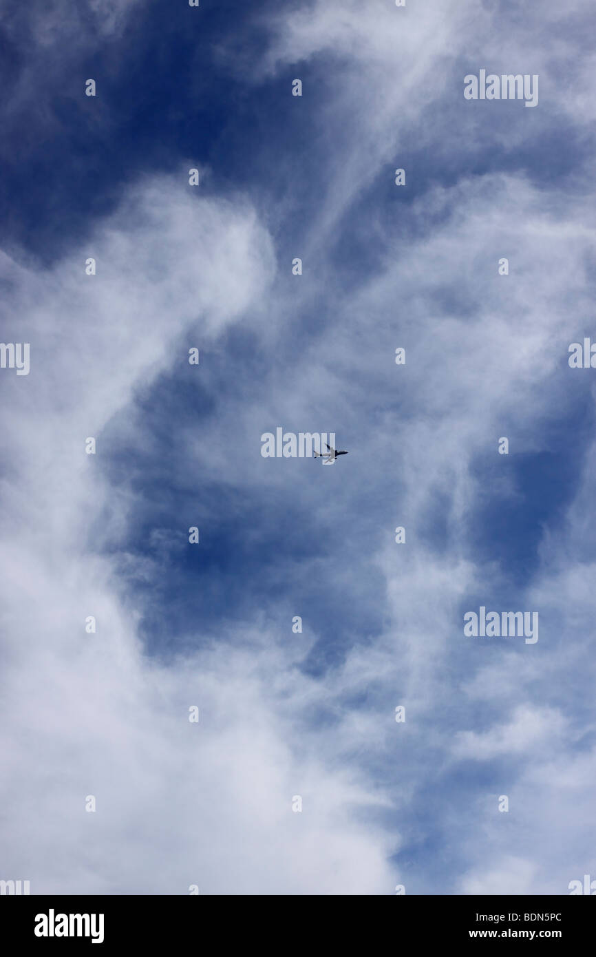 Commercial jetliner flying over Long Island enroute to JFK airport Stock Photo Alamy
