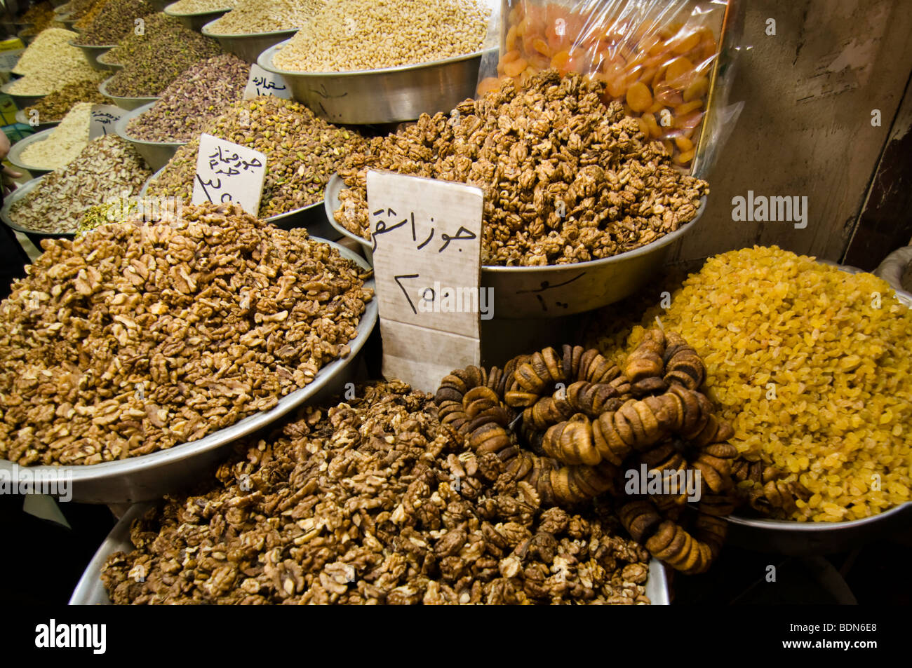 Nuts and dried fruit on display in a shop in the Souk El-Hamidiyeh (market) in Damascus. Stock Photo