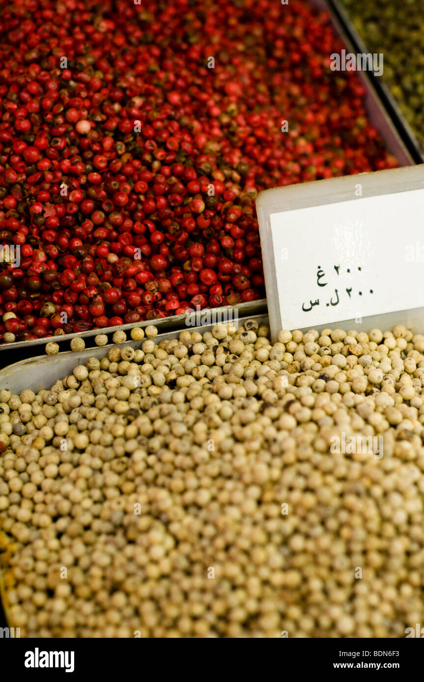 Red and white peppercorns on display in a vendor's shop in the Souk El-Hamidiyeh (market) in Damascus. Stock Photo