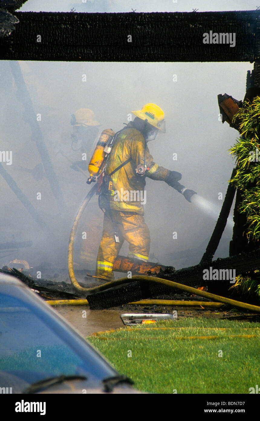 extinguish fire house roof shingle auto smoke flame danger risk mask