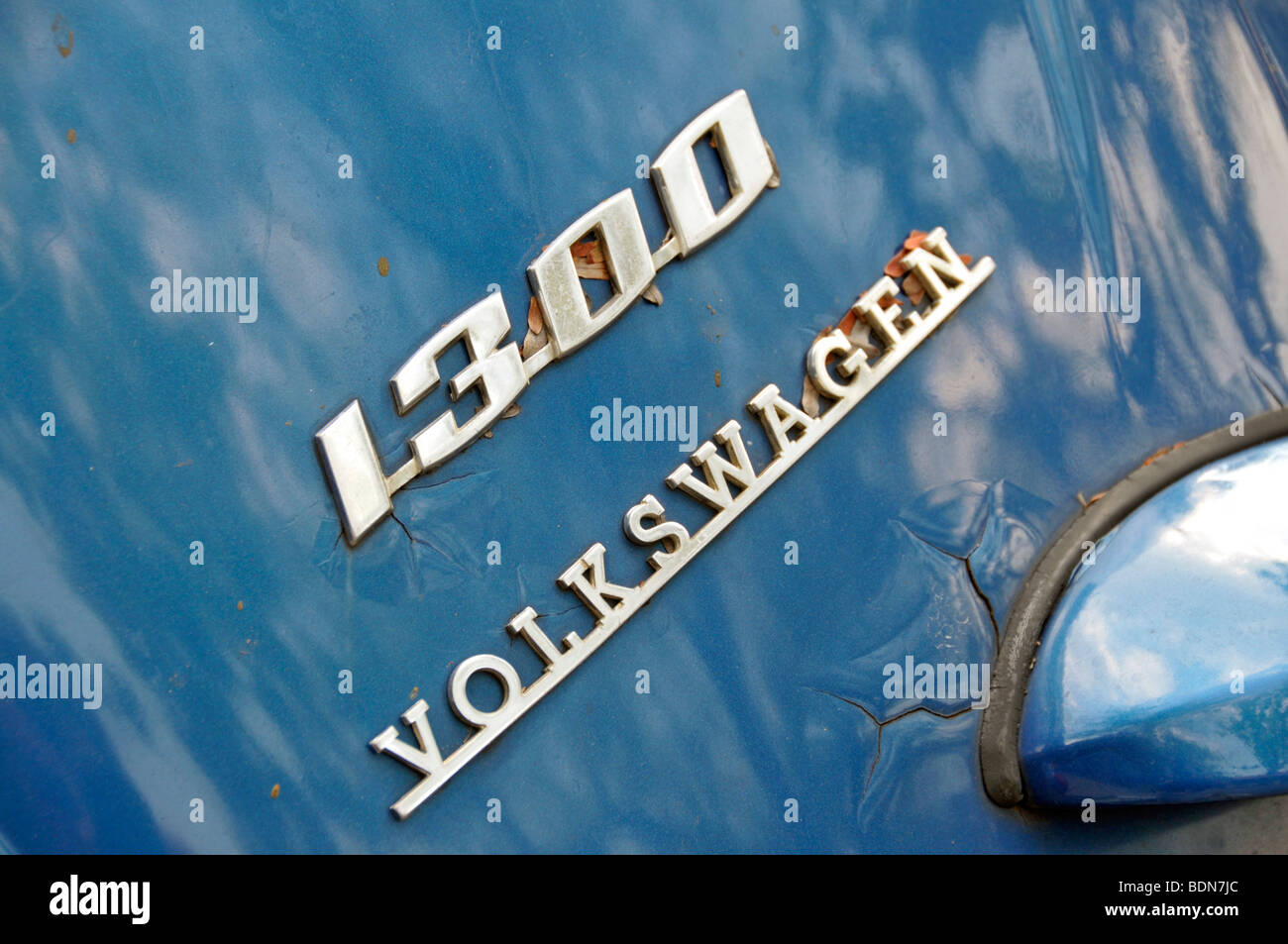 Old VW Beetle 1300 emblem Stock Photo