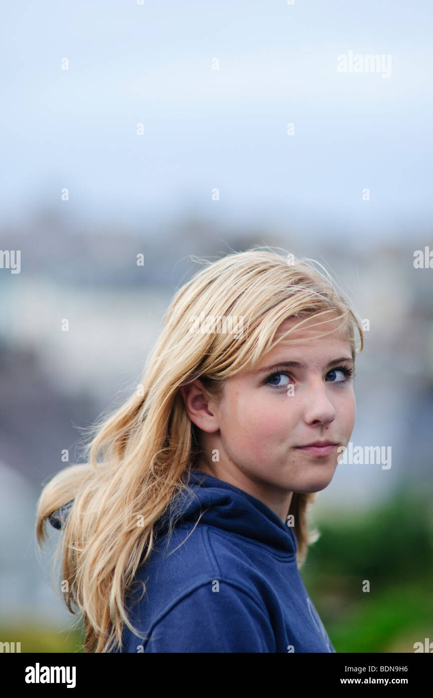 Fifteen year old blond haired teenage girl, UK Stock Photo