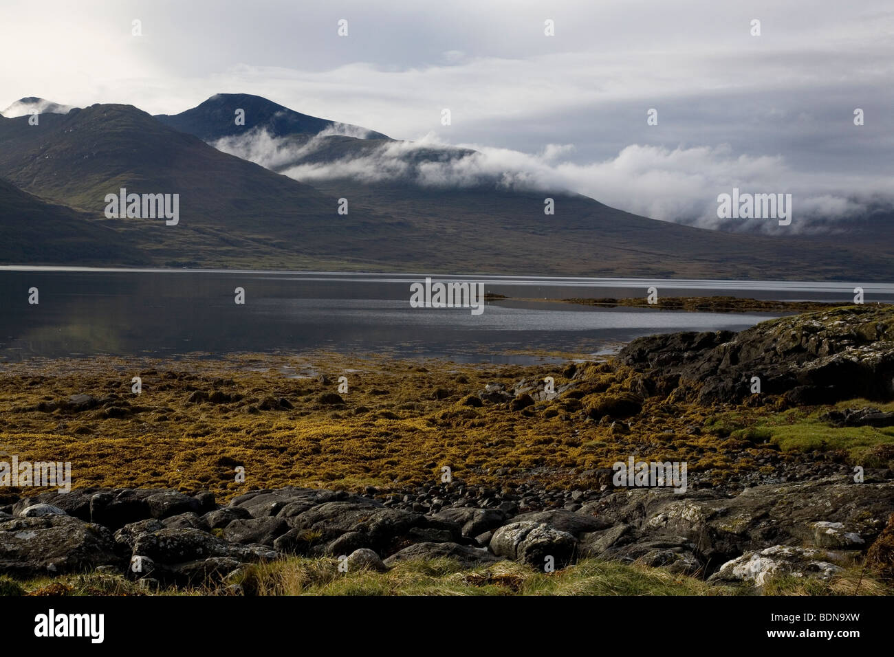 Low cloud over lower slopes of Ben More range at Loch Na Kael on the Isle of Mull, Scotland, United Kingdom. Stock Photo