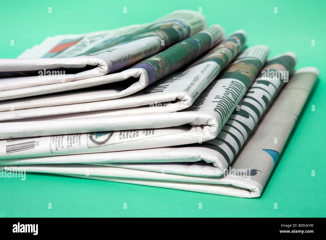 Pile of daily newspapers Stock Photo