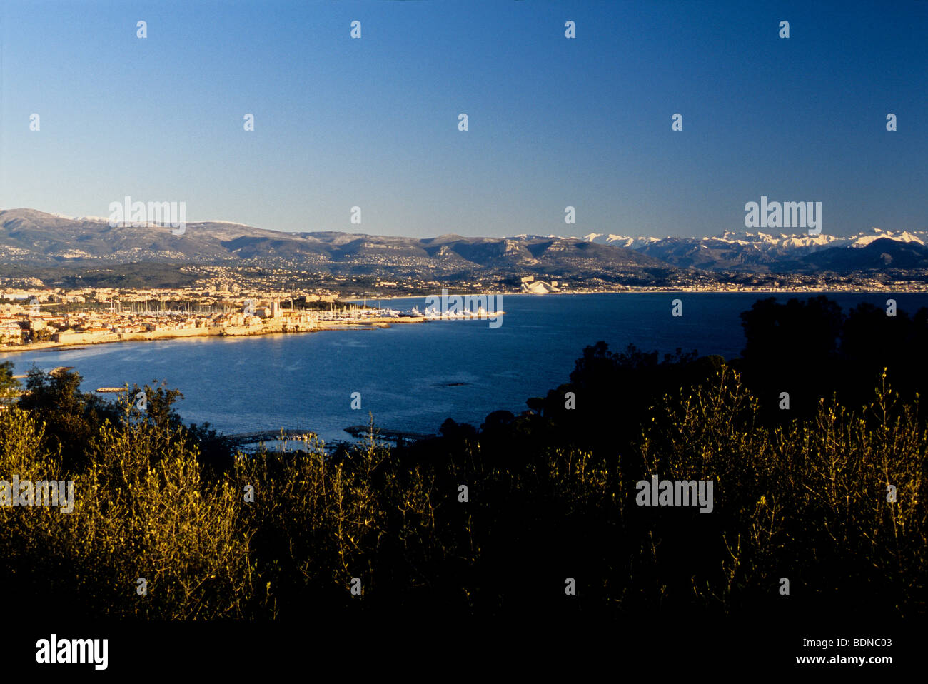 Top view above the bay and the city of Antibes in a winter morning Stock Photo