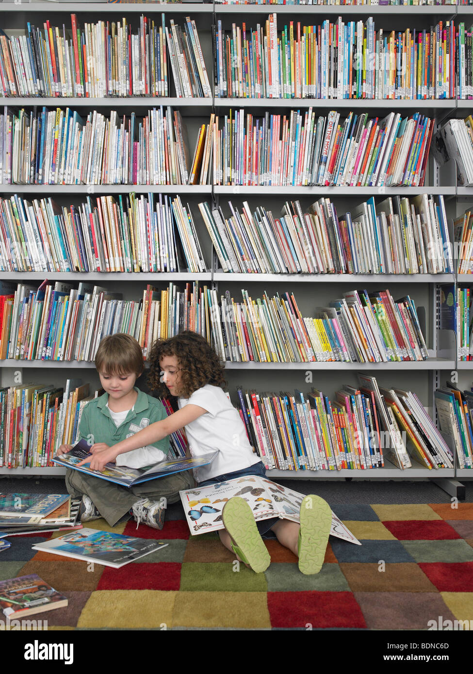 Boy and Girl with Picture Books Stock Photo - Alamy