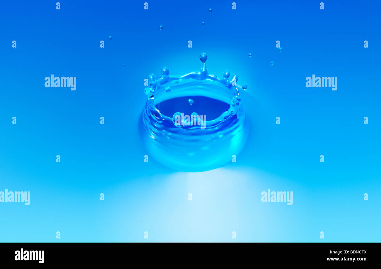 Splash in water creating crown shape Stock Photo