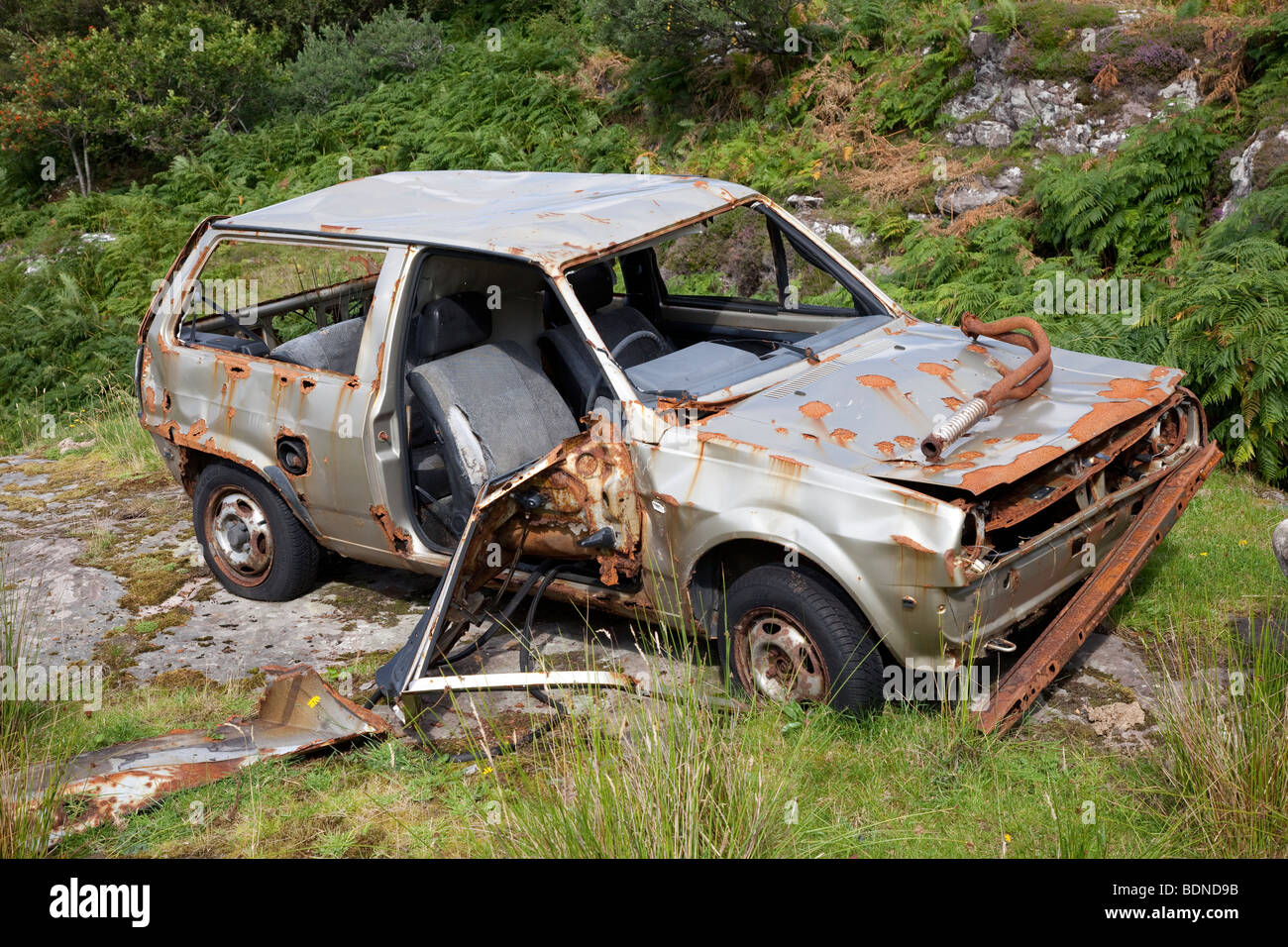 Rusting abandoned vintage Car, Ardmair Bay, Ullapool, Scotland, UK
