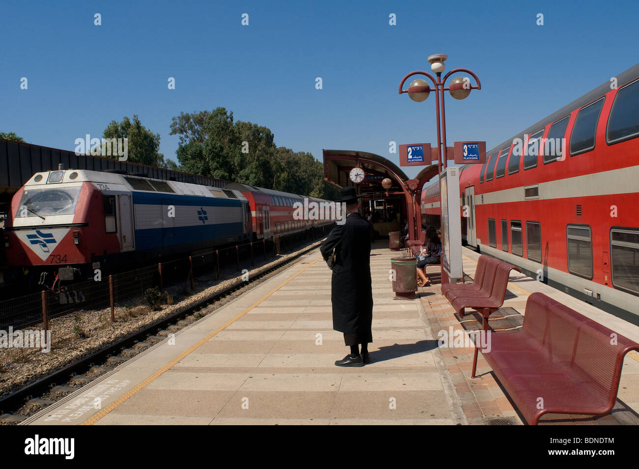 Ultra orthodox Jew at the platform of Netanya railway station in Israel Stock Photo