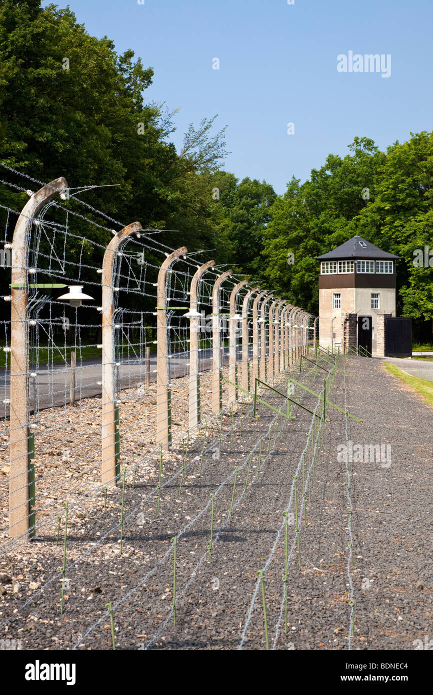 Barbed wire fence and guard tower at the Buchenwald Nazi Concentration Camp, Ettersberg, Germany, Europe Stock Photo