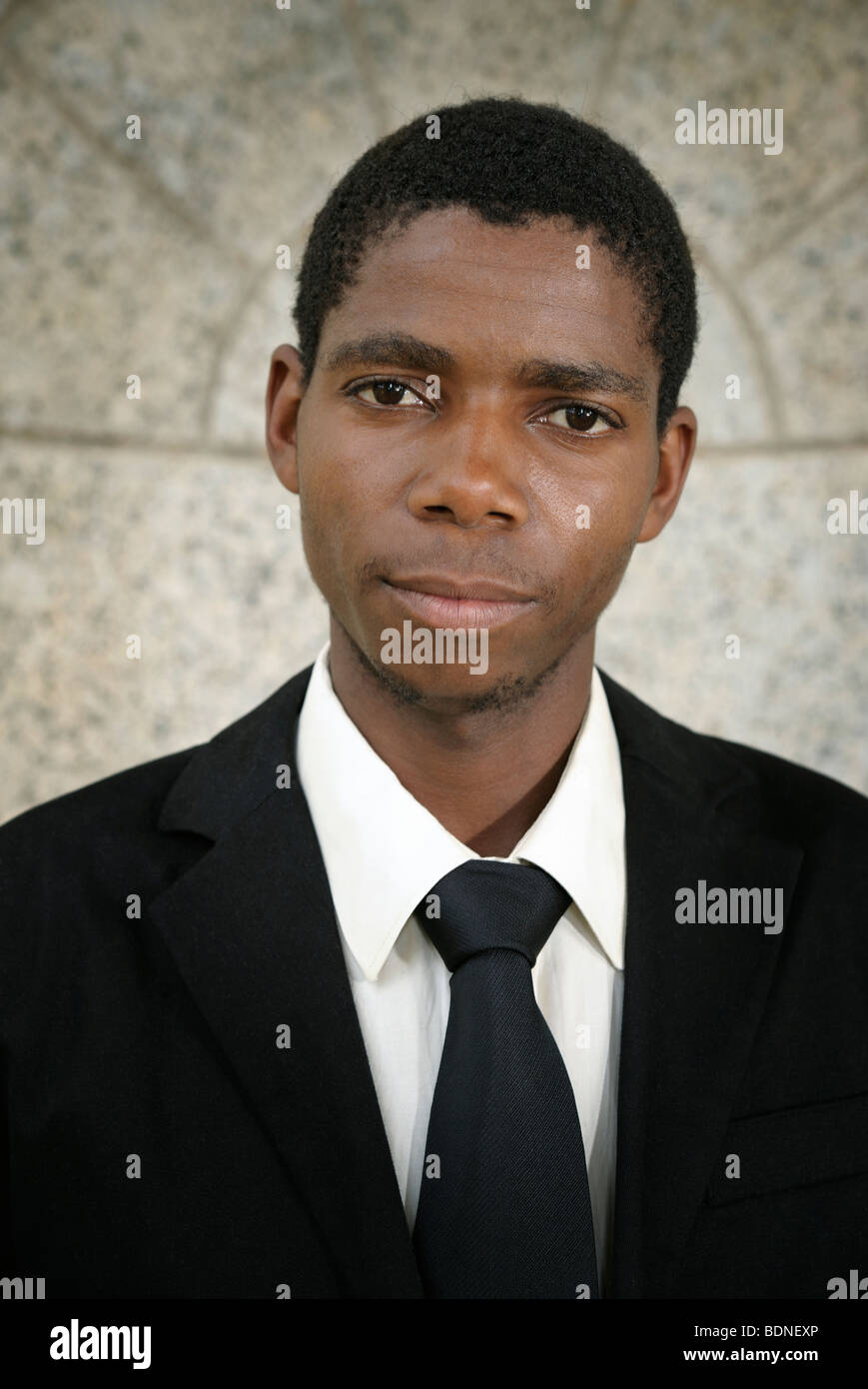 Portrait of young black man wearing full suit, Cape Town, Western Cape Province, South Africa Stock Photo
