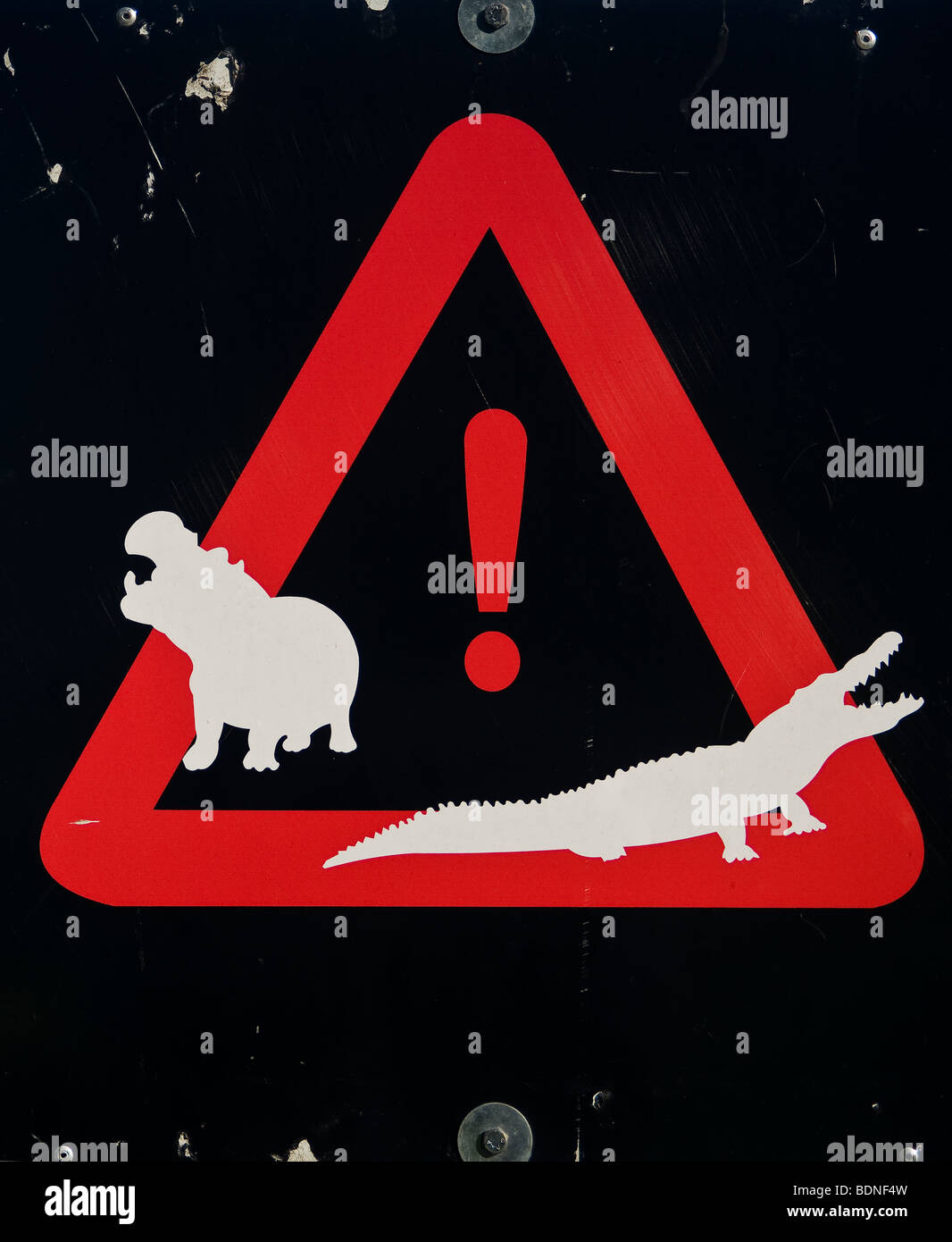 Hippopotamus and crocodile warning sign, St Lucia Estuary, KwaZulu-Natal Province, South Africa Stock Photo