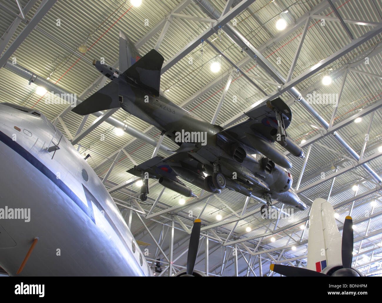 Suspended in the Air Space Hangar roof space is this fine example of the BAe Harrier GR3 jump jet. Stock Photo