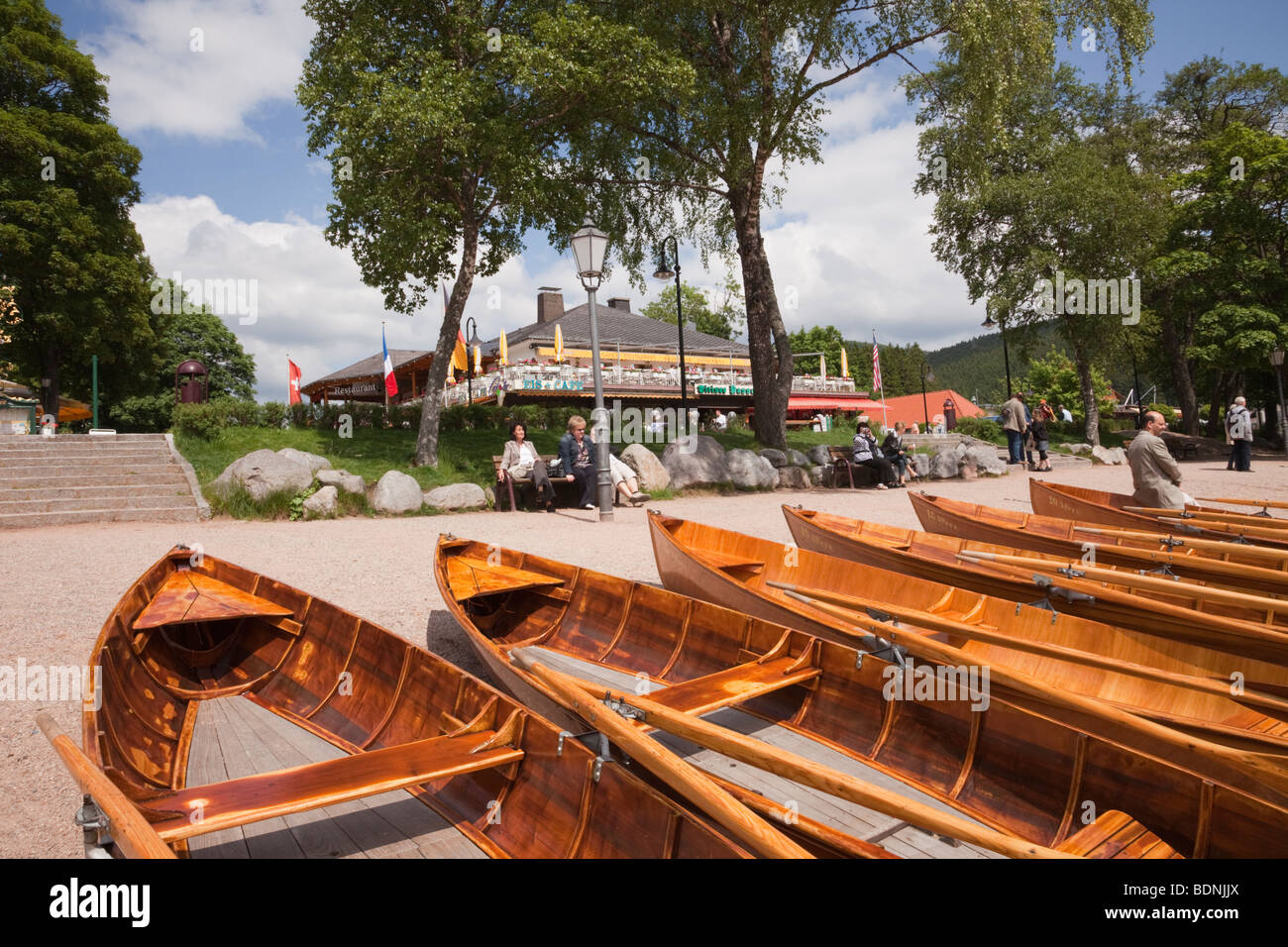 Titisee, Baden-Wurttemberg, Germany, Europe. Boats for hire on Lake Titisee shore in Black Forest resort town Stock Photo