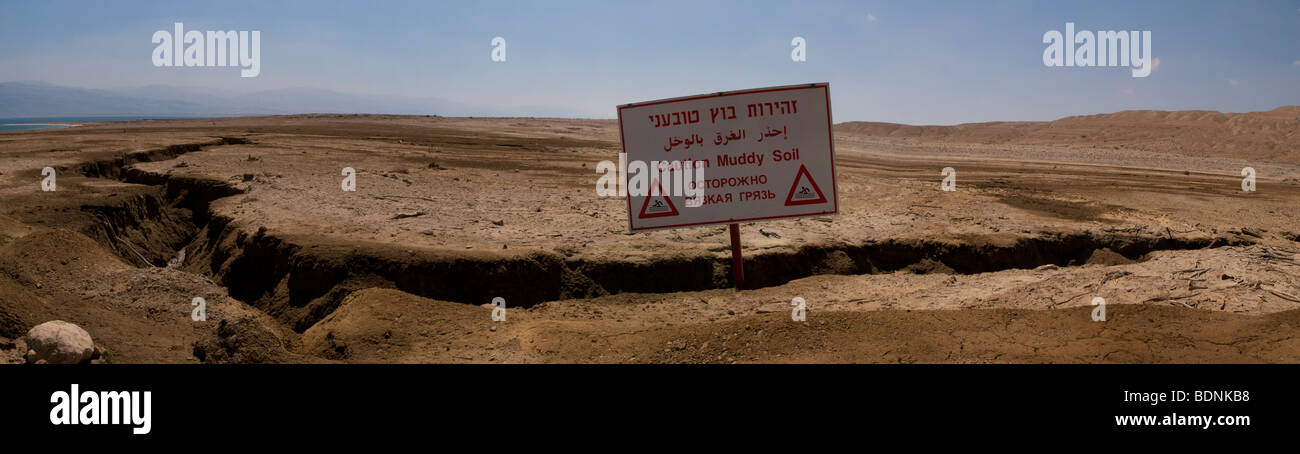 Large sinkholes at the Dead Sea coast in Israel Stock Photo